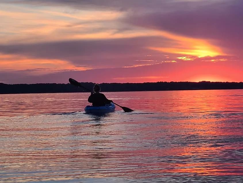 Kayaking on Torch Lake at sunset